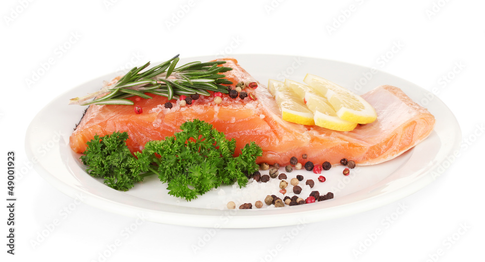 Fresh salmon fillet with herbals and lemon slices Fresh salmon fillet with herbals and lemon slices