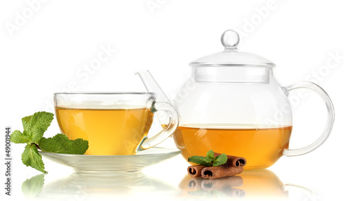 Cup of tea with mint and cinnamon isolated on white