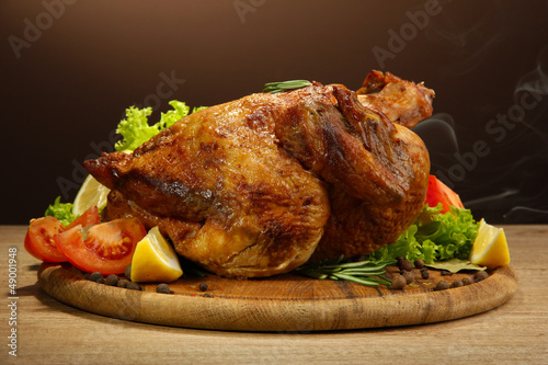 Whole roasted chicken with vegetables,