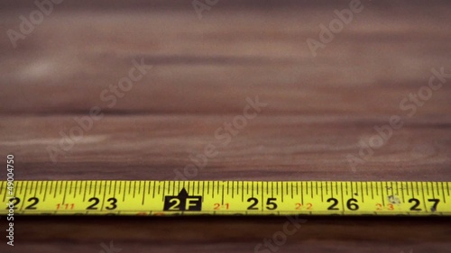 wood floor and measuring tape