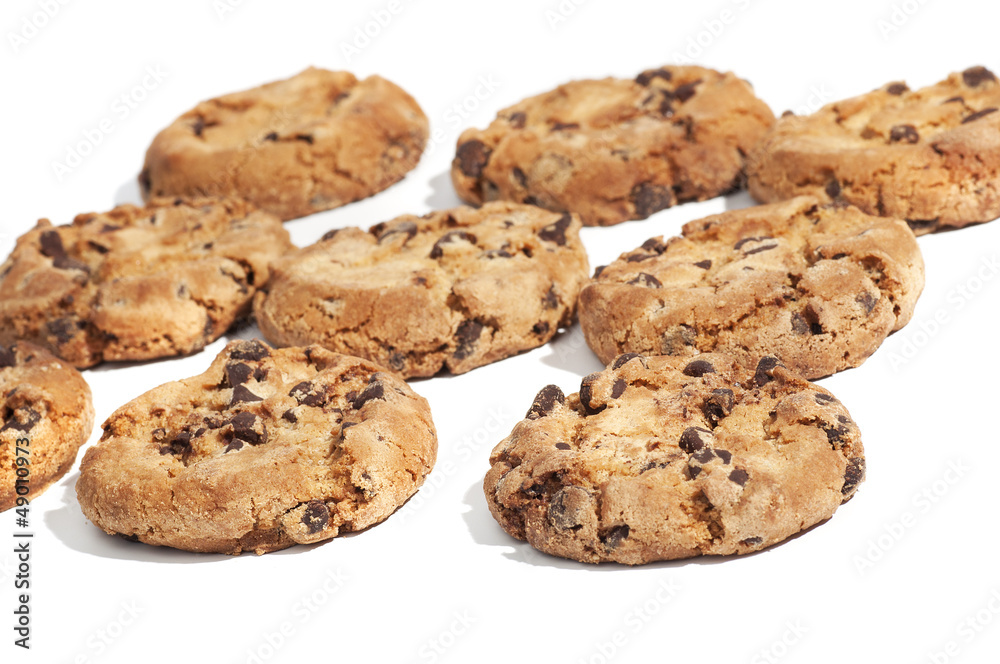 Chocolate cookies aligned, isolated on white background Chocolate cookies aligned, isolated on white background