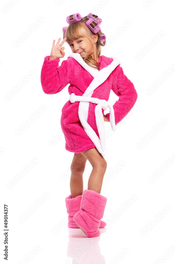 Little girl in pink bathrobe