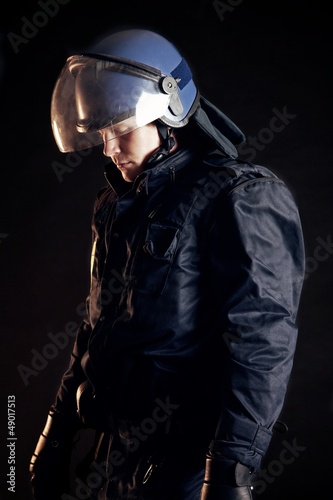 Police Officer Wearing Protective Uniform