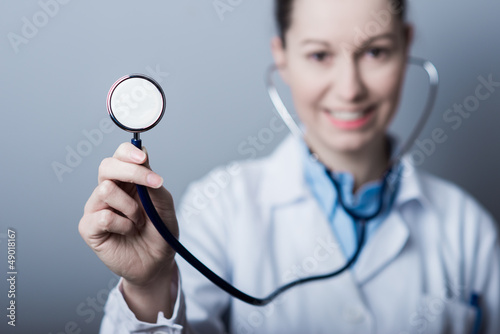 Female Doctor holding stethoscope (shallow Depth Of Field).