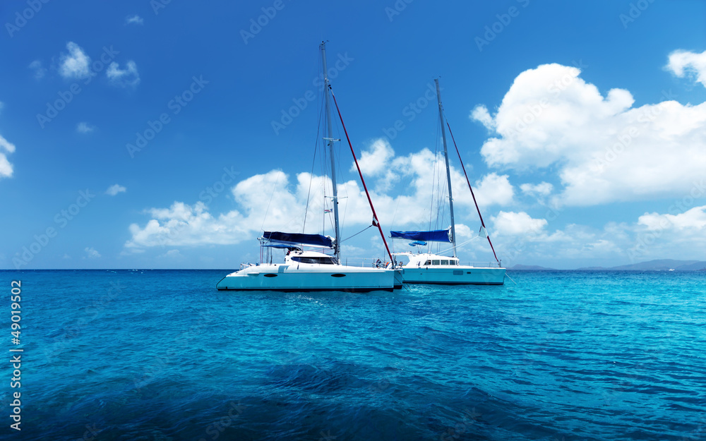 Yacht Sailing on water of ocean