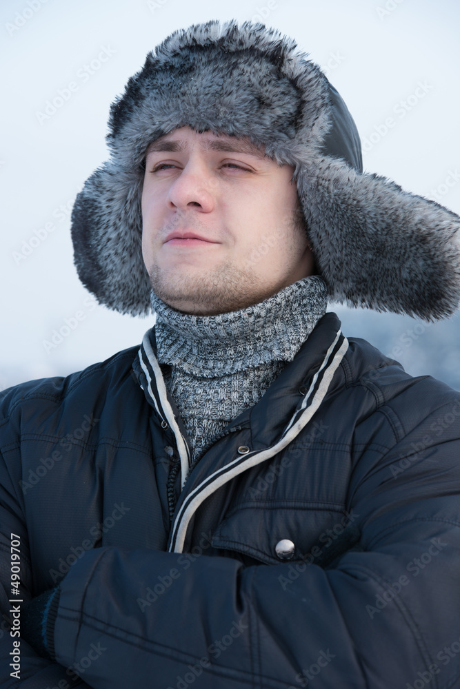 man in a fur winter hat man in a fur winter hat