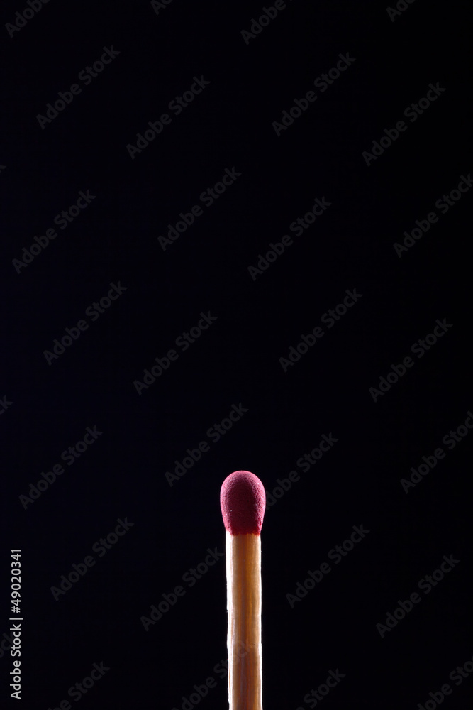 macro shot of match head, on black background macro shot of match head, on black background