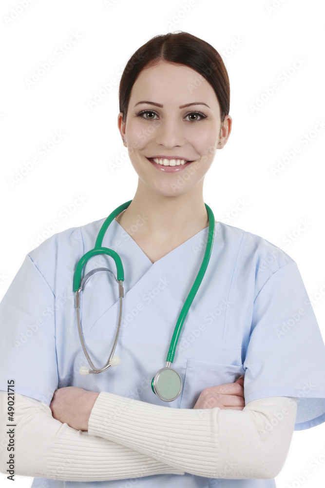 Krankenpflegerin im blauen Kittel lächelt