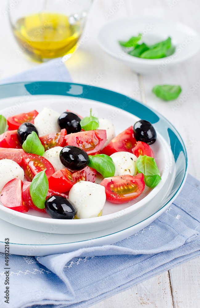 Tomato salad with mozzarella and basil