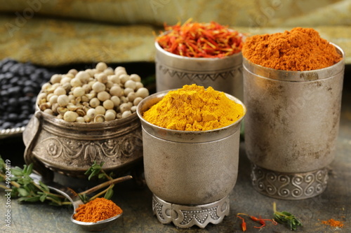 various spices (turmeric, paprika, saffron, coriander)