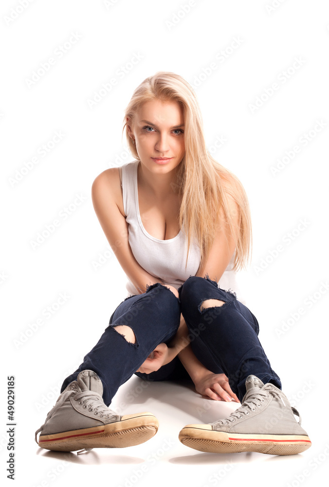 Blond teenage girl sitting