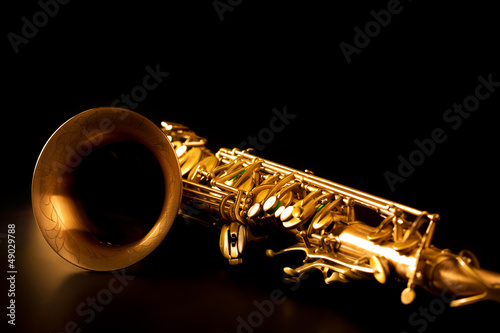 Obraz na plátně Tenor sax golden saxophone macro selective focus