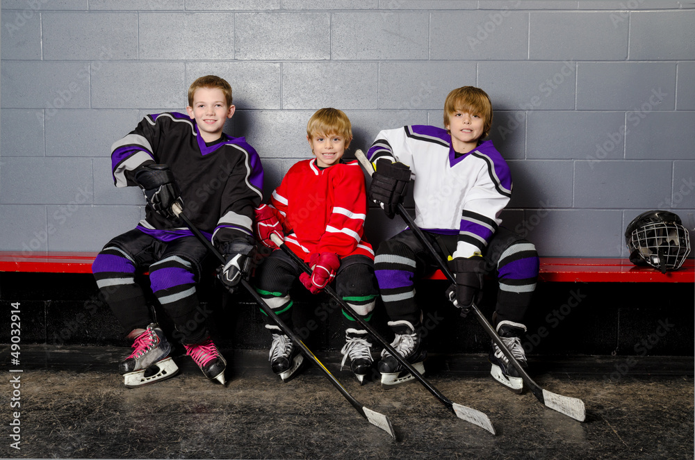 Obraz premium Youth Hockey Players in Dressing Room