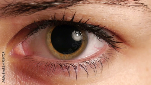 womans dilated pupil photo