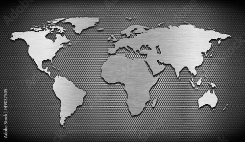 metal world map on grate comb background