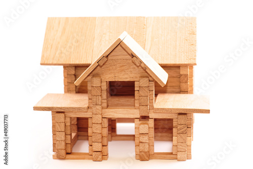 Toy wooden house isolated on white