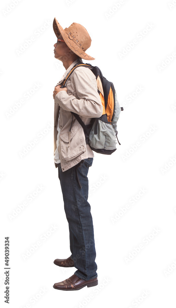 Naklejka premium side view of backpacker standing on white