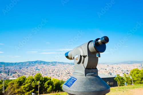 Telescope look at the city Barcelona. Spain