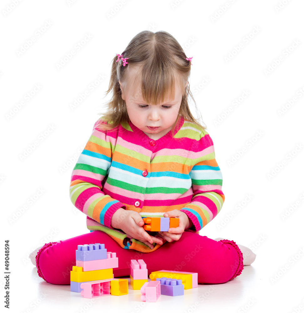 child playing with colourful toys. Isolated on white background child playing with colourful toys. Isolated on white background