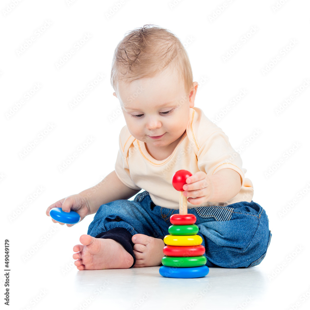 cute baby boy playing with colorful toy isolated on white backgr cute baby boy playing with colorful toy isolated on white backgr