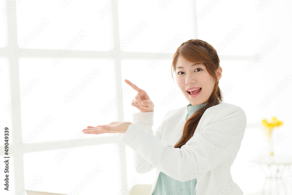 Beautiful young businesswoman working in office Beautiful young businesswoman working in office