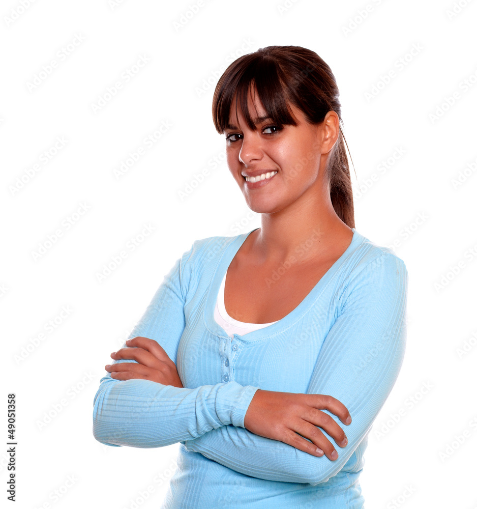 Pretty young woman smiling and looking at you Pretty young woman smiling and looking at you