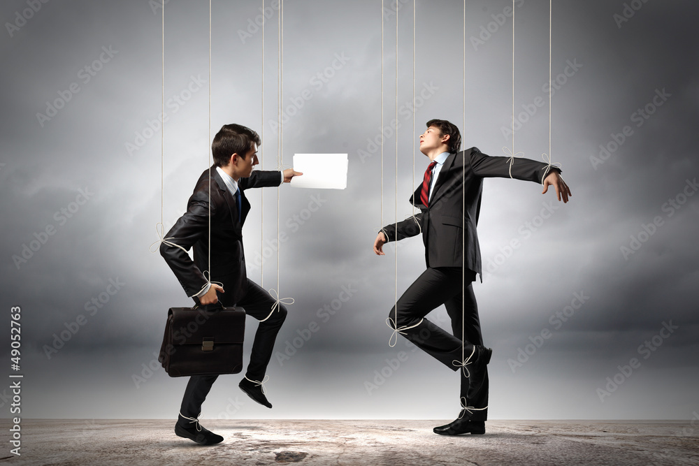 Obraz premium Puppet businesspeople