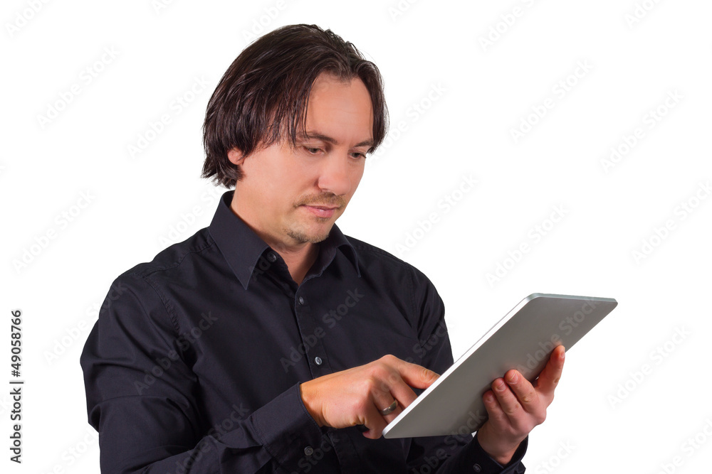 Man browsing on a tablet computer Man browsing on a tablet computer
