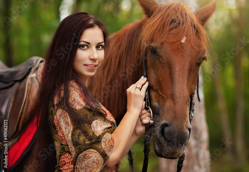woman with a horse outdoor