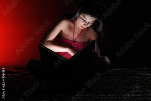 Light of book - the girl seriously reading