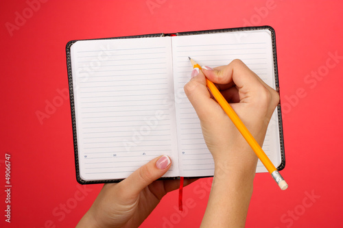 Hand write on notebook  on color background