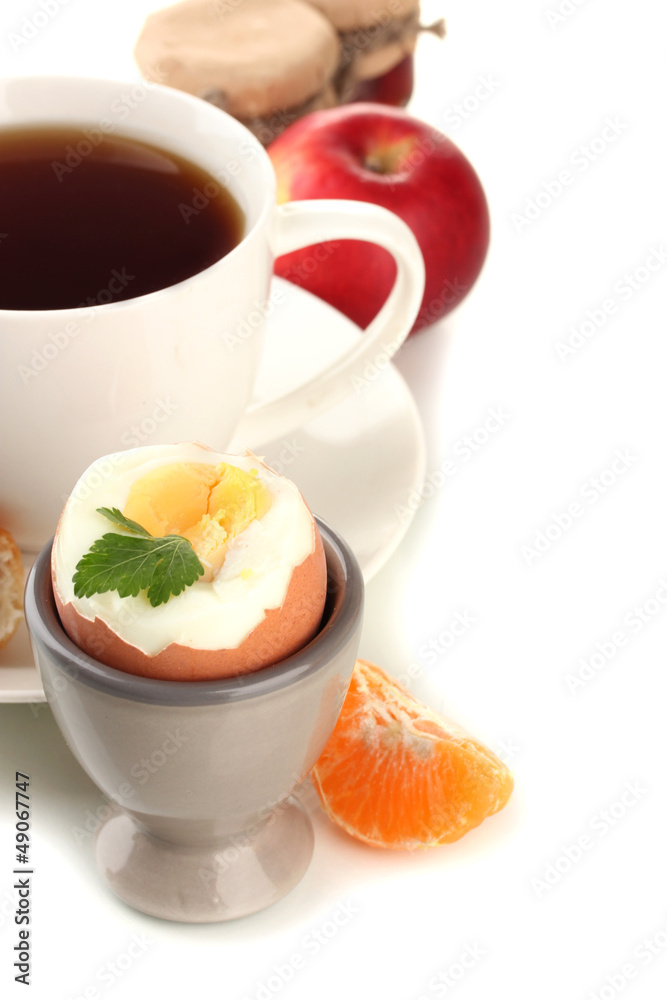 Light breakfast with boiled egg and cup of coffee, isolated Light breakfast with boiled egg and cup of coffee, isolated