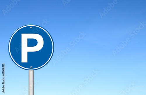 parking sign with a blue sky