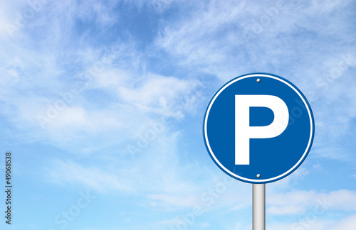 parking sign with a blue sky