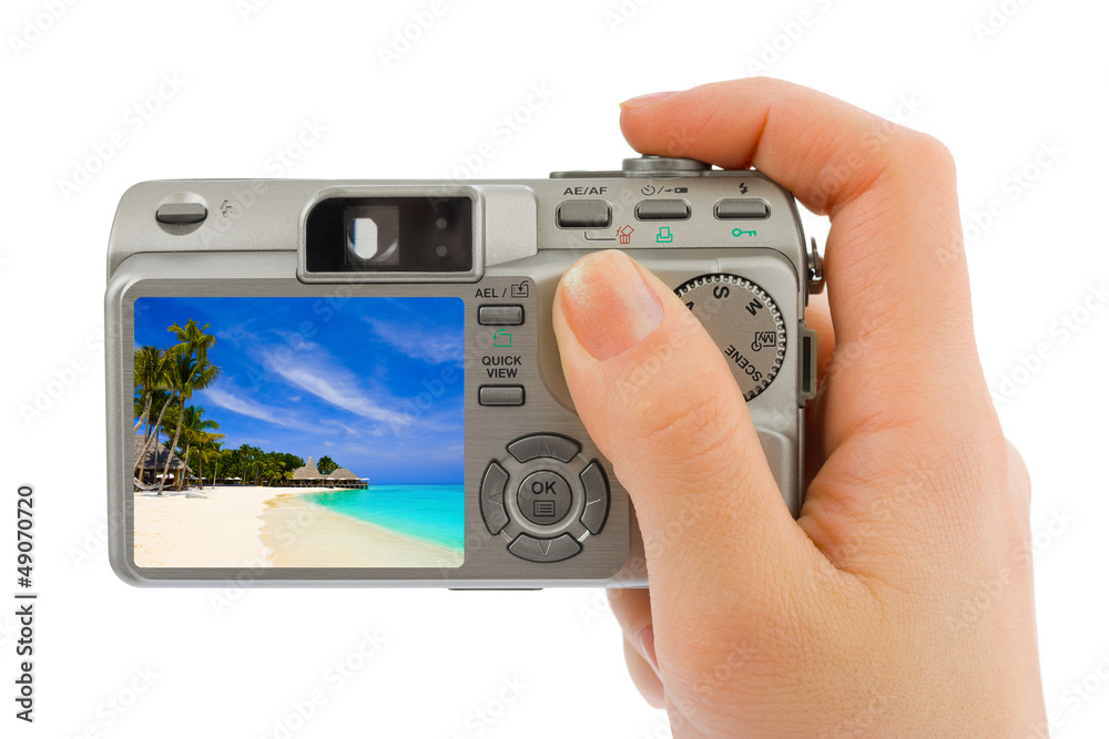 Hand with camera and landscape (my photo) Hand with camera and landscape (my photo)