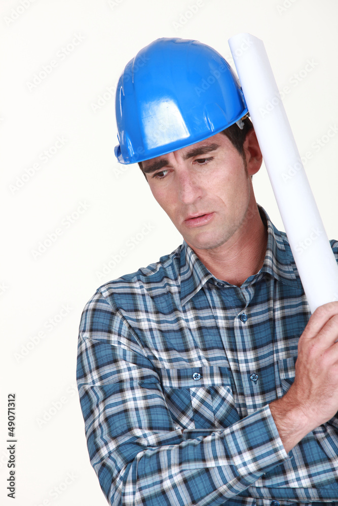 Operator with paper roll over the shoulder Operator with paper roll over the shoulder