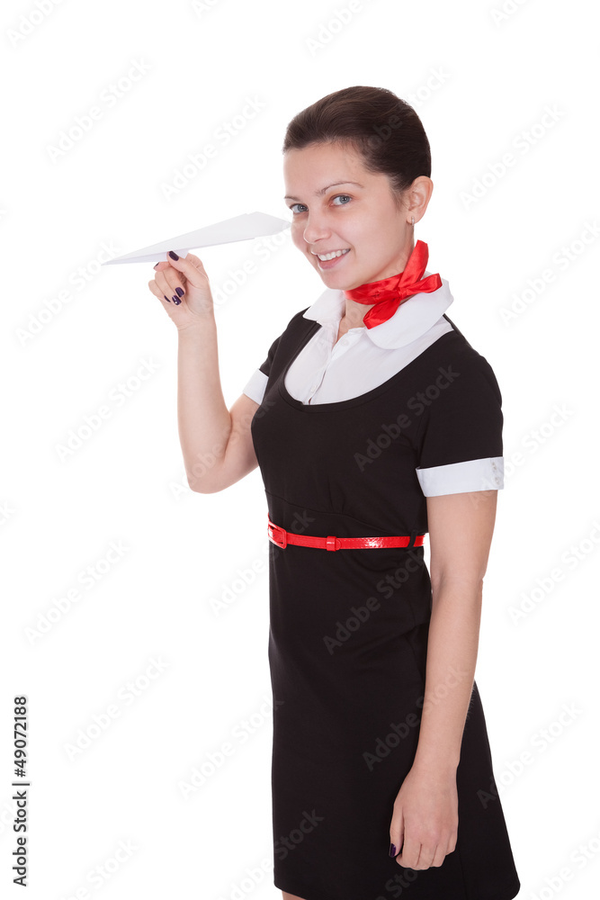 Beautiful flight attendant with paper airplane Beautiful flight attendant with paper airplane