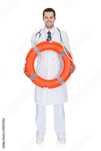 Smiling Male Doctor Holding Rescue Ring