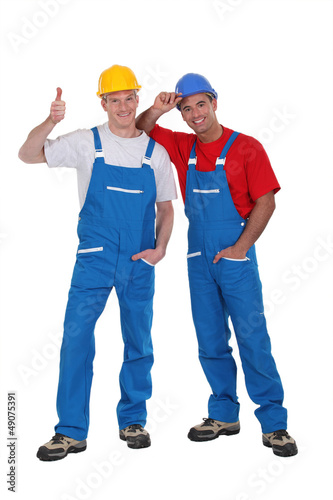 two craftsmen posing together
