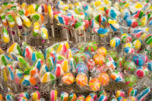 Fototapeta Naklejka Na Ścianę i Meble -  Mixed colorful fruit lollypop