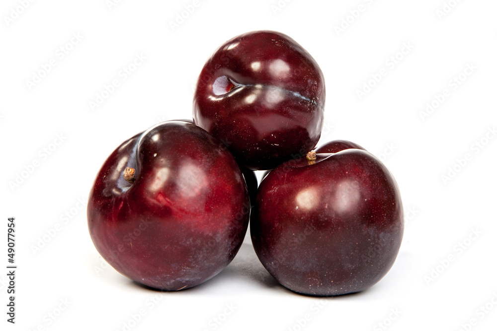 Group of plums on white Group of plums on white