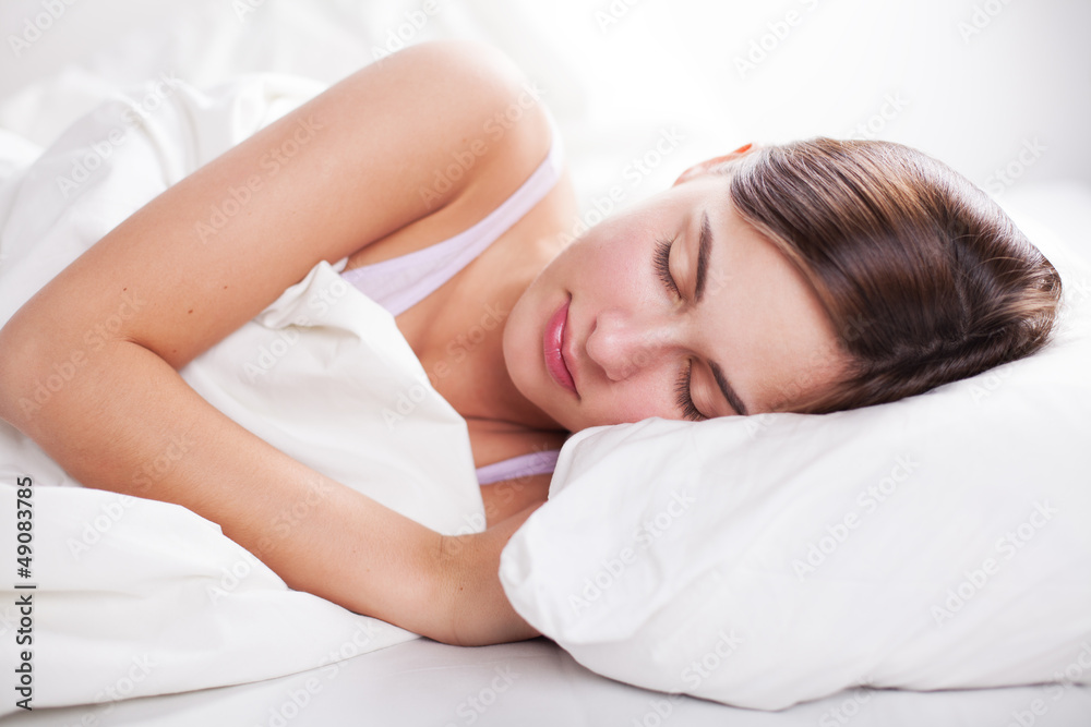 portrait of young woman in bed portrait of young woman in bed