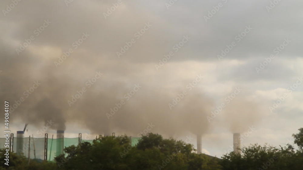 Global warming concept: smoke coming out of smokestack.