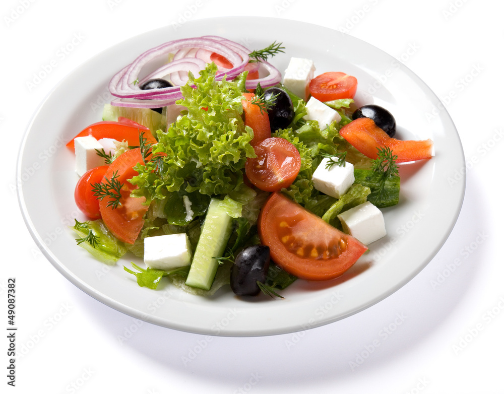 Salad served on white plate