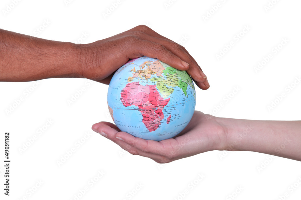 Hands cupped around a globe Hands cupped around a globe