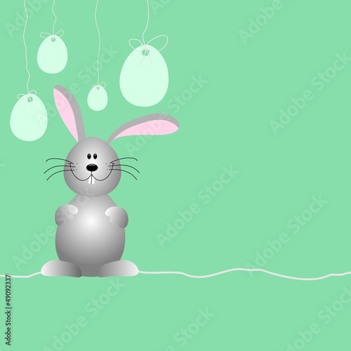 Moderner Ostergruß mit Hase und Eiern auf grün