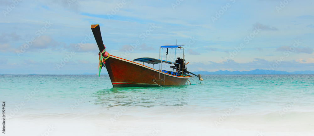 Longtail boat on the sea tropical beach Longtail boat on the sea tropical beach