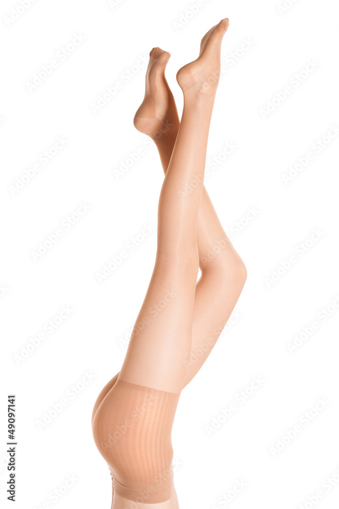 skin color stockings on long sexy legs isolated on white skin color stockings on long sexy legs isolated on white