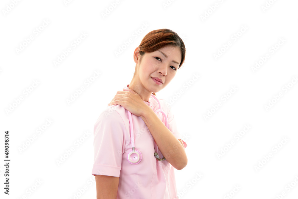 肩こりを訴える女医 肩こりを訴える女医