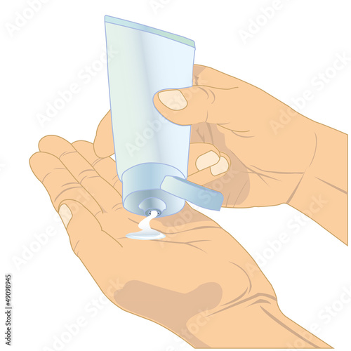 hands holding cosmetic cream tube
